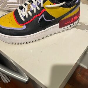 Nike Air Sneakers in Yellow, Black, and Red